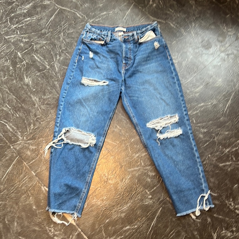 Ripped blue jeans